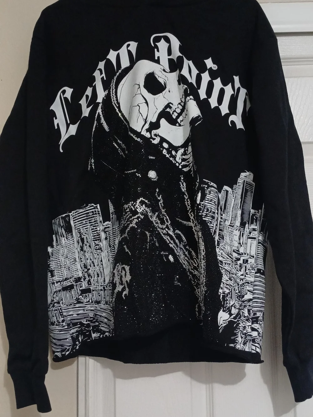 Black Crewneck Sweater with White Skull Graphic